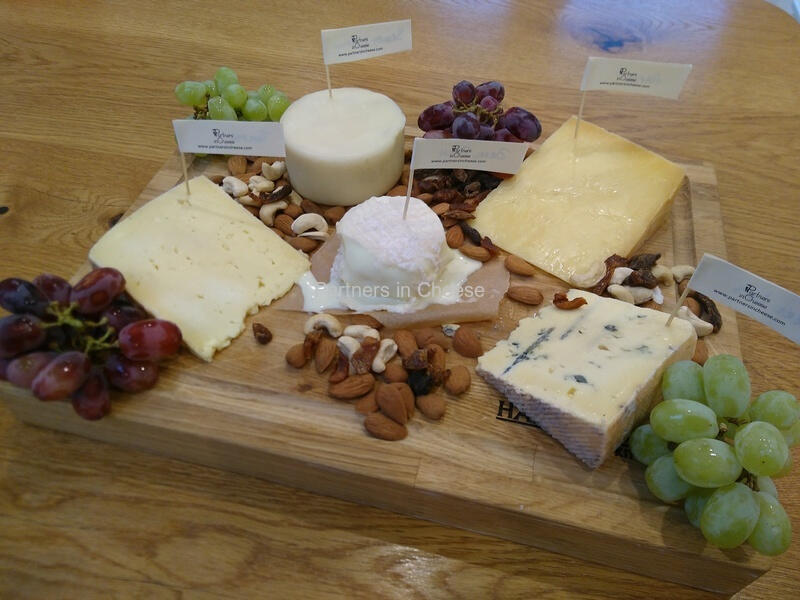 Cheeseboard with grapes and nuts